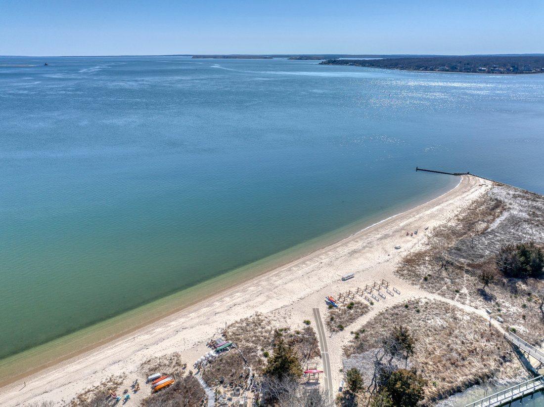 Aerial view of pristine sandy beach and clear waters