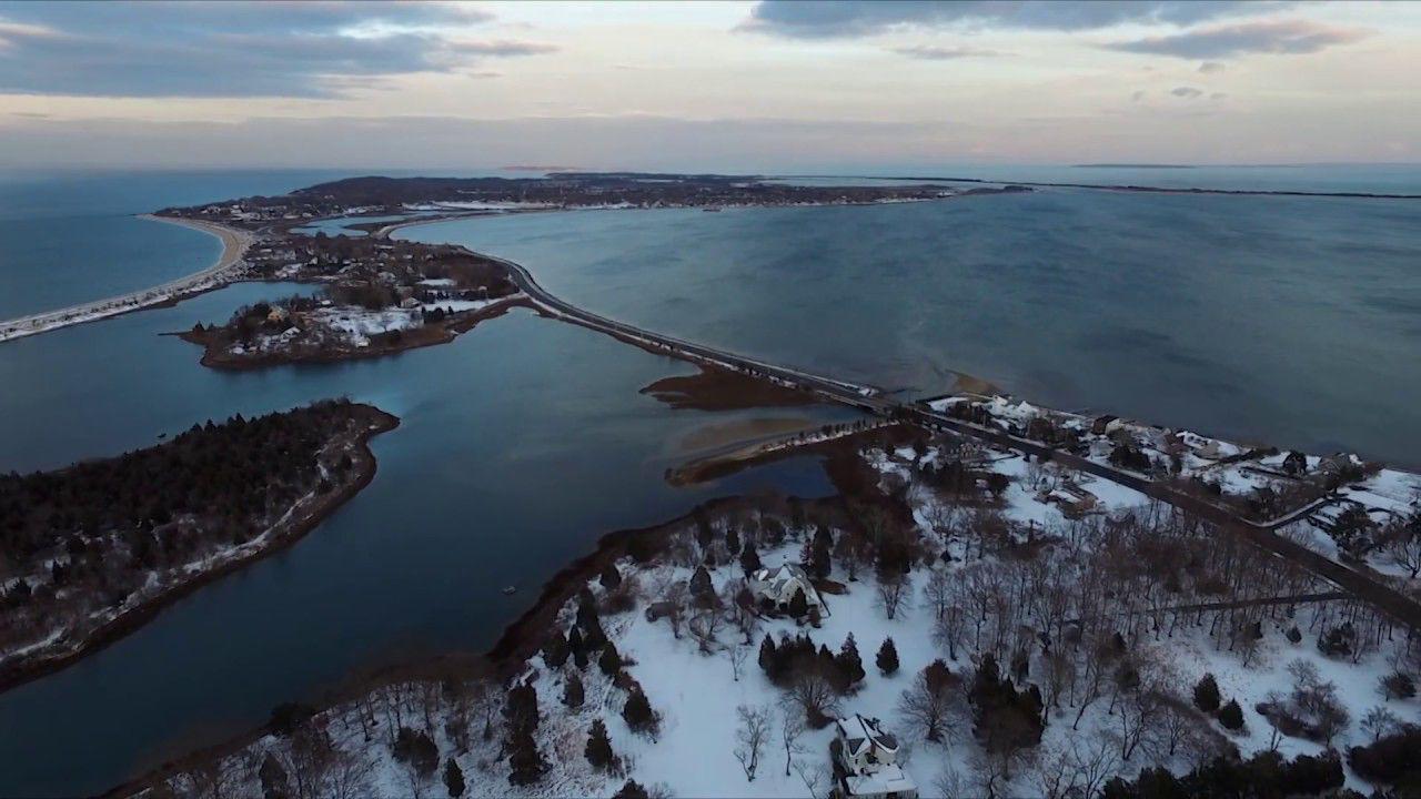 Winter aerial view of East Marion showing snow-covered landscape and waterways